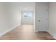 Bedroom with wood-look floors and a window which provides natural light at 3220 Riley Ave, Charlotte, NC 28269