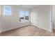 Bedroom with plenty of light from two large windows and clean, neutral finishes at 3220 Riley Ave, Charlotte, NC 28269