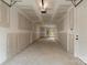Clean, spacious two-car garage with ample room for parking and storage, featuring a bright interior at 3220 Riley Ave, Charlotte, NC 28269