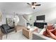 Open-concept living room featuring modern furnishings and an abundance of natural light at 3220 Riley Ave, Charlotte, NC 28269