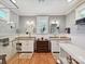 Elegant bathroom with double vanity, granite counters, and a glass-enclosed shower at 332 Delburg St, Davidson, NC 28036