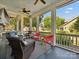 Inviting covered porch provides a relaxing outdoor living space with neighborhood views at 332 Delburg St, Davidson, NC 28036