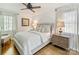 This cozy bedroom features natural light, stylish furnishings, and a neutral color palette at 3620 Champaign St, Charlotte, NC 28210