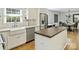 Bright eat-in kitchen with stainless steel appliances and an island at 3620 Champaign St, Charlotte, NC 28210