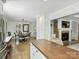 Open living space featuring an eat-in kitchen, dining room, fireplace, and Gathering room at 3620 Champaign St, Charlotte, NC 28210