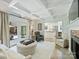 Living room featuring coffered ceilings, hardwood floors, and access to the patio at 3620 Champaign St, Charlotte, NC 28210