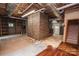 Unfinished basement featuring exposed ceilings and cinder block walls offering potential for storage or further customization at 3700 Nw Gainesway Nw Ct, Concord, NC 28027