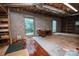 Unfinished basement area with exposed ceilings and cinder block walls, offering space for storage or customization at 3700 Nw Gainesway Nw Ct, Concord, NC 28027