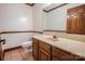 Bathroom featuring warm toned cabinets, tile flooring, and neutral paint at 3700 Nw Gainesway Nw Ct, Concord, NC 28027