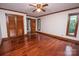 Spacious bedroom with hardwood floors, natural lighting, and ample closet space perfect for storage and relaxation at 3700 Nw Gainesway Nw Ct, Concord, NC 28027
