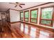 A primary bedroom with natural light, hardwood floors, neutral walls, and detailed trim at 3700 Nw Gainesway Nw Ct, Concord, NC 28027
