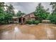 Charming brick home featuring an arched entryway, skylight, and beautiful landscaping on a wooded lot at 3700 Nw Gainesway Nw Ct, Concord, NC 28027