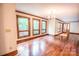 Living room featuring hardwood floors, natural light, chandelier, and neutral walls at 3700 Nw Gainesway Nw Ct, Concord, NC 28027
