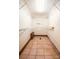 Spacious walk-in closet featuring metal shelving and tile floors at 3700 Nw Gainesway Nw Ct, Concord, NC 28027