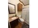 Cozy bathroom featuring vanity with granite countertop and glass shower doors at 400 Archibald Rd, Concord, NC 28025