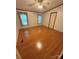Bright, airy bedroom featuring hardwood floors and natural light at 400 Archibald Rd, Concord, NC 28025