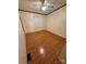 Bedroom featuring wood floor, ceiling fan, and window at 400 Archibald Rd, Concord, NC 28025