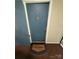 Entrance featuring a painted blue door with an adjacent door and a welcome mat in front at 415 Orchard Trace Ln # 8, Charlotte, NC 28213
