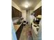 Kitchen with older appliances, an unorganized countertop, and tiled backsplash at 415 Orchard Trace Ln # 8, Charlotte, NC 28213