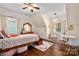 Bright ' bedroom features hardwood floors and warm natural light at 417 N Dotger Ave, Charlotte, NC 28204