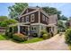 Charming two-story home with a well-manicured front yard and inviting curb appeal at 417 N Dotger Ave, Charlotte, NC 28204
