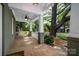 Spacious front porch with swing, providing a relaxing outdoor living space at 417 N Dotger Ave, Charlotte, NC 28204