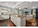 Open kitchen flows to cozy living room; perfect for entertaining guests at 417 N Dotger Ave, Charlotte, NC 28204