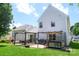 Backyard featuring outdoor seating, a hot tub, and grassy lawn at 417 Trillium Sw Ct, Conover, NC 28613