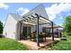 Backyard featuring outdoor seating, a grassy lawn, and privacy fence at 417 Trillium Sw Ct, Conover, NC 28613