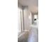 The hallway features neutral carpet and many doors to other rooms at 417 Trillium Sw Ct, Conover, NC 28613