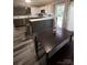 Well-equipped kitchen with a view of the dining area, stainless steel appliances, and natural light at 417 Trillium Sw Ct, Conover, NC 28613