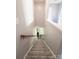 The stairwell has carpeted stairs, handrail and white risers at 417 Trillium Sw Ct, Conover, NC 28613