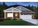 Charming brick home with a two-car garage, manicured lawn, and inviting front porch at 432 Bent Burr Crk, York, SC 29745