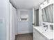 Neat bathroom featuring a shower with curtain, vanity, and neutral tones creating a serene space at 4711 Truscott Rd, Charlotte, NC 28226
