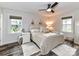 Cozy bedroom with shiplap walls, wood floors, and bright windows creating a relaxing atmosphere at 4711 Truscott Rd, Charlotte, NC 28226