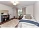 Comfortable bedroom with natural light, a beige rug, and a single bed at 4711 Truscott Rd, Charlotte, NC 28226
