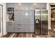 Bright kitchen with gray cabinets, modern appliances, and ample storage space at 4711 Truscott Rd, Charlotte, NC 28226