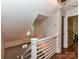 Staircase with a railing leading to a different floor at 4711 Truscott Rd, Charlotte, NC 28226