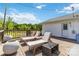 Wide, wooden deck with lounge chairs, table, and garden planters for relaxing outdoors at 4855 Saluda Rd, Rock Hill, SC 29730