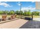 Wide, wooden deck with seating and outdoor storage, perfect for relaxing outdoors at 4855 Saluda Rd, Rock Hill, SC 29730