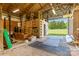 Well-equipped barn interior with storage space, workout equipment, and a serene view of the outdoors at 4855 Saluda Rd, Rock Hill, SC 29730