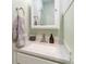 This cozy bathroom has a sink with granite top and a gray towel, all well lit at 4855 Saluda Rd, Rock Hill, SC 29730