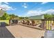 Outdoor deck featuring wood flooring, lounge chairs, and a grill setup at 4855 Saluda Rd, Rock Hill, SC 29730