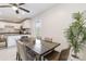 Bright dining room featuring a dark wooden table and a leafy green house plant at 4855 Saluda Rd, Rock Hill, SC 29730