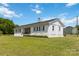 Side view of a well-maintained single-story home featuring a green lawn at 4855 Saluda Rd, Rock Hill, SC 29730