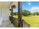 View from the front porch overlooks expansive lawn and mature trees at 4855 Saluda Rd, Rock Hill, SC 29730