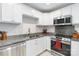 Close-up of a modern kitchen with stainless steel appliances and granite countertops at 4855 Saluda Rd, Rock Hill, SC 29730