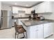 This kitchen has stainless steel appliances, white cabinets and granite countertops at 4855 Saluda Rd, Rock Hill, SC 29730