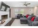 Comfortable living room features a brick fireplace and plenty of seating at 4855 Saluda Rd, Rock Hill, SC 29730