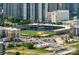 An aerial view focuses on the local baseball stadium amid the city landscape at 513 N Graham St # 1B, Charlotte, NC 28202